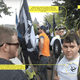 Andrew Alexander Murphy Harkins (background, right) at the Charlottesville, Va., Unite the Right Rally standing next to James Alex Fields (seen to the left of Harkins)